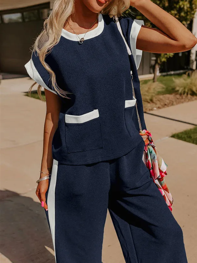 Hot Selling  Spring And Summer New Simple Stitching Color Contrast High-grade Elegant Commuter Crewneck Two-piece Suit Set display picture 30
