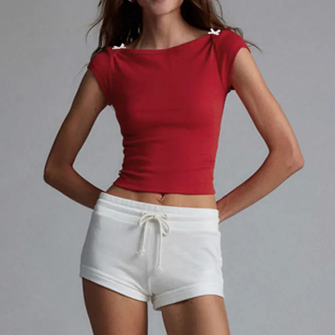 Designed   Spring And Summer New Fashion Trend Solid Color Shoulder T-shirt Bow Decoration Slim Top display picture 24