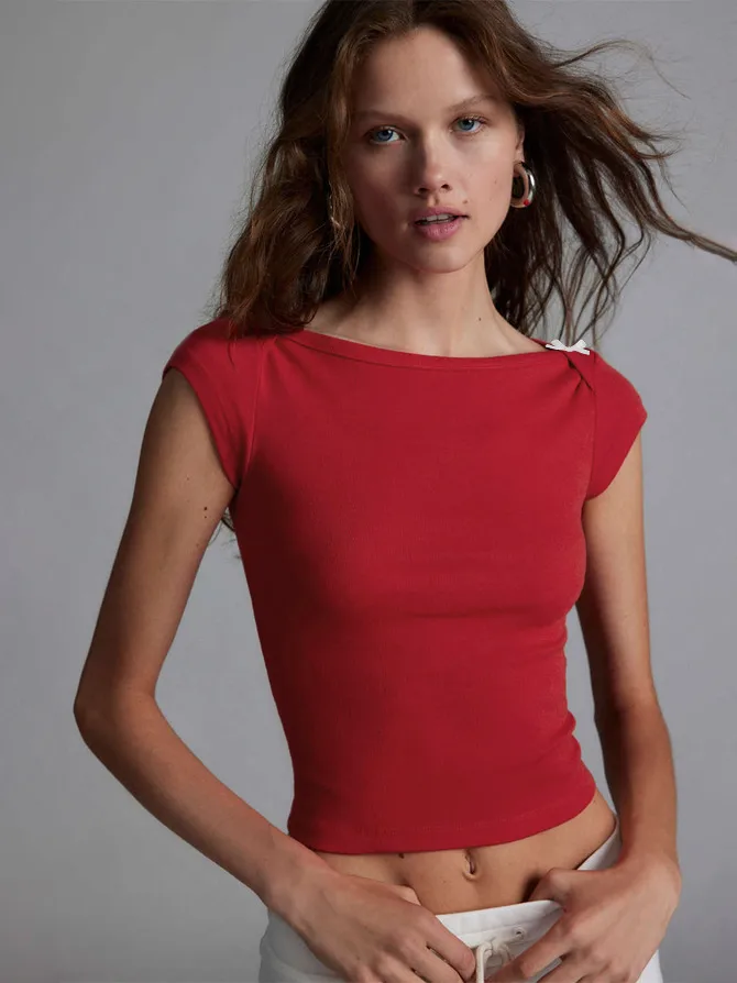 Designed   Spring And Summer New Fashion Trend Solid Color Shoulder T-shirt Bow Decoration Slim Top display picture 23