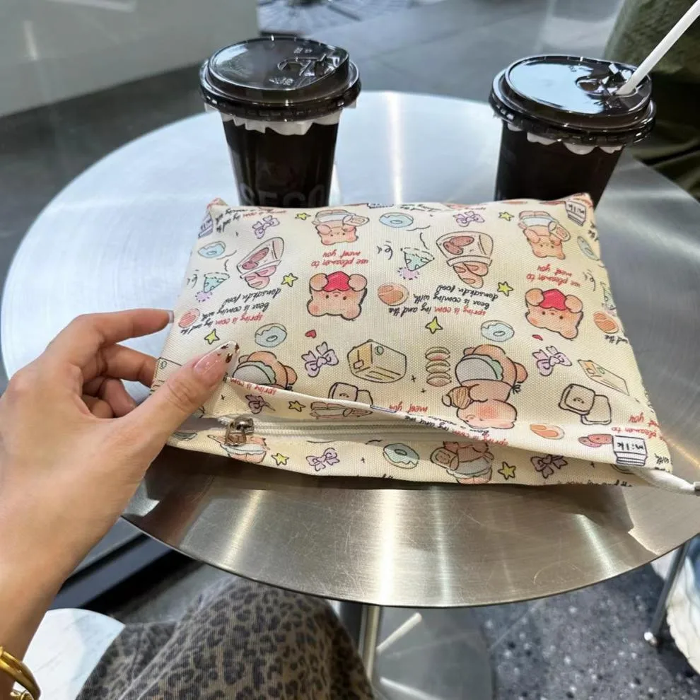 New Ins Cream Cosmetic Bag Large Capacity Portable Small Items Buggy Bag Travel Earphone Bag Coin Purse display picture 5