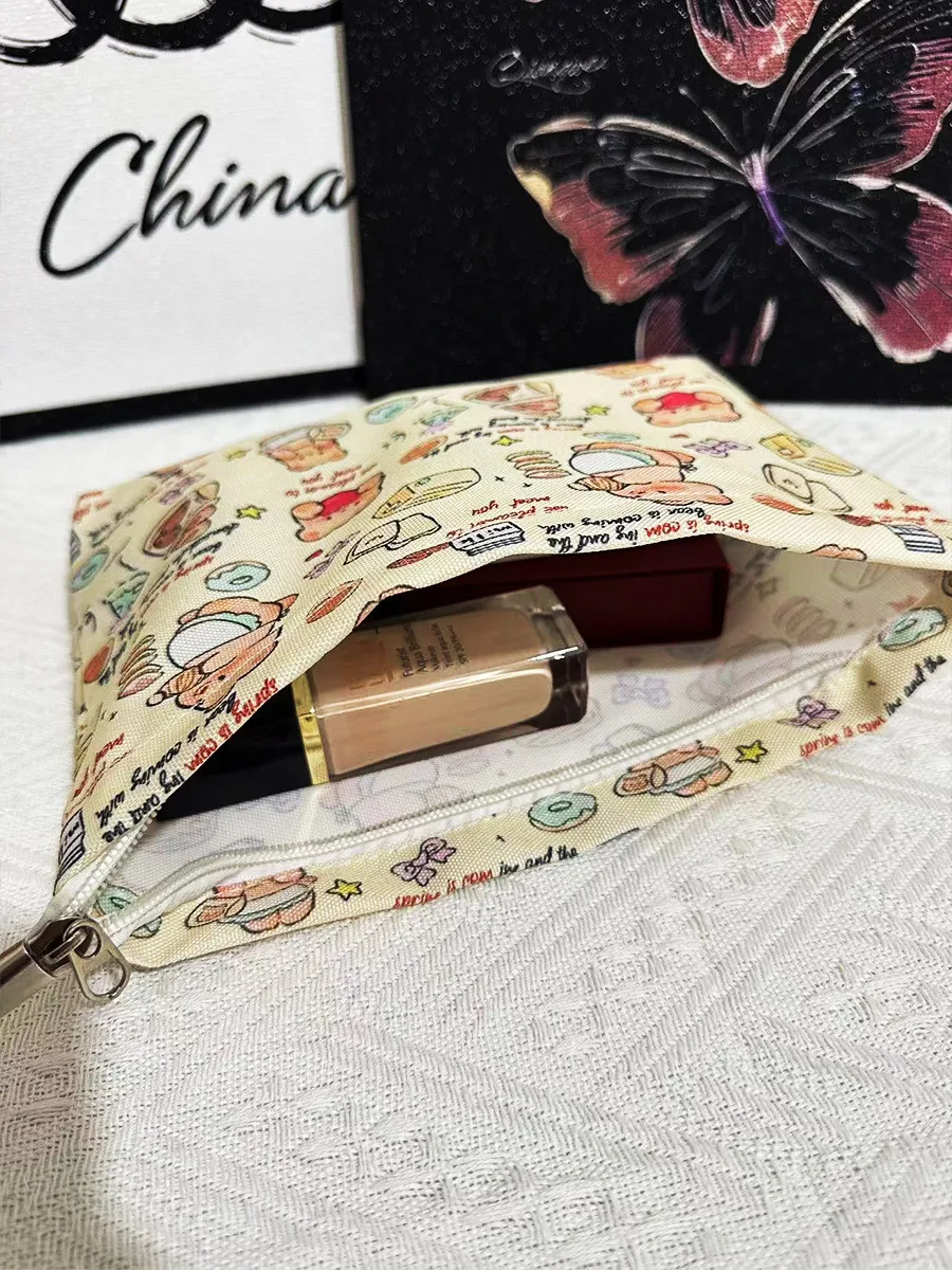 New Ins Cream Cosmetic Bag Large Capacity Portable Small Items Buggy Bag Travel Earphone Bag Coin Purse display picture 6