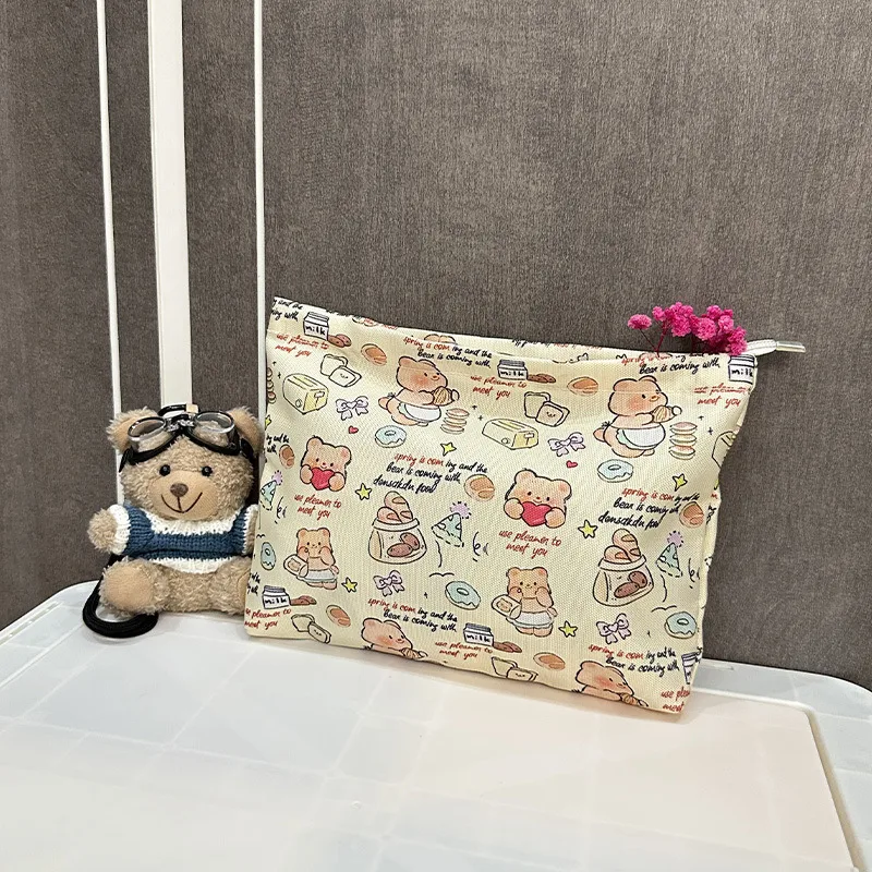 New Ins Cream Cosmetic Bag Large Capacity Portable Small Items Buggy Bag Travel Earphone Bag Coin Purse display picture 7