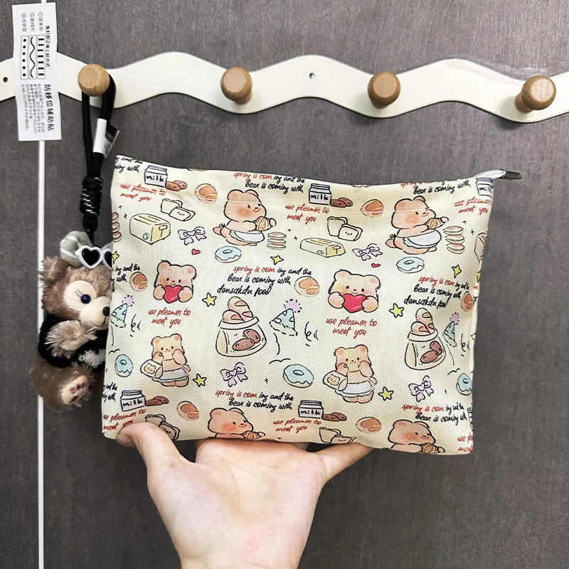 New Ins Cream Cosmetic Bag Large Capacity Portable Small Items Buggy Bag Travel Earphone Bag Coin Purse display picture 8