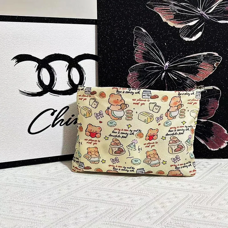 New Ins Cream Cosmetic Bag Large Capacity Portable Small Items Buggy Bag Travel Earphone Bag Coin Purse display picture 11
