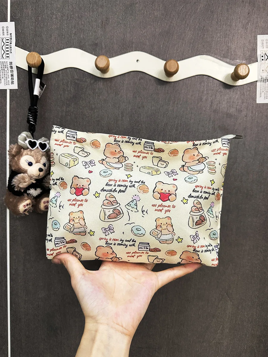 New Ins Cream Cosmetic Bag Large Capacity Portable Small Items Buggy Bag Travel Earphone Bag Coin Purse display picture 14
