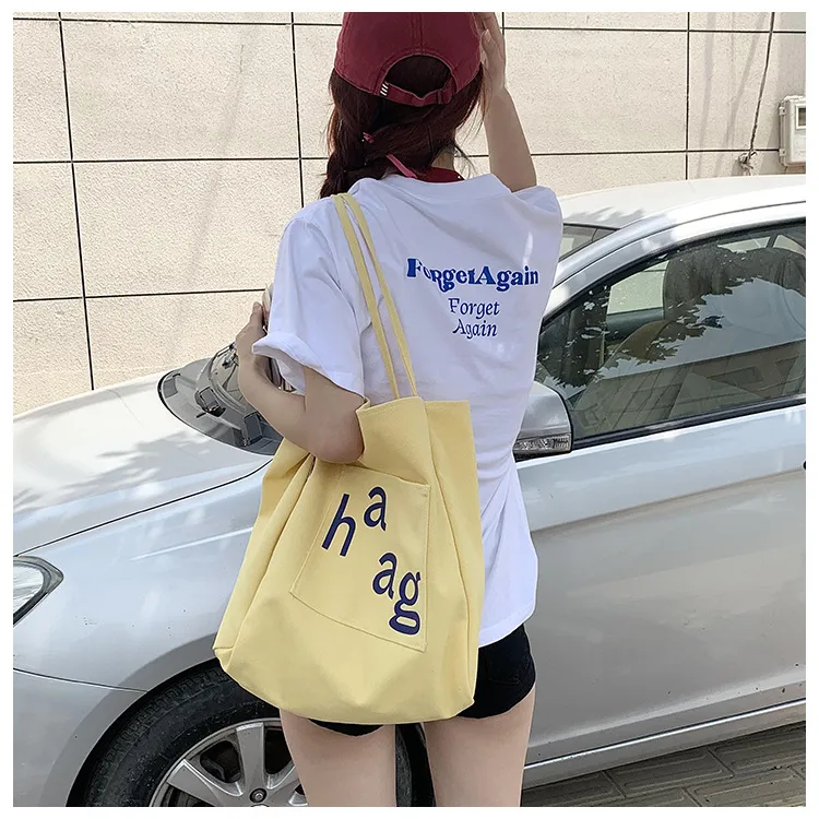 Letter Printed Canvas Women's Tote Bag Literary Style Large Capacity Student Schoolbag 2024 New Fashion Shoulder Bag display picture 14