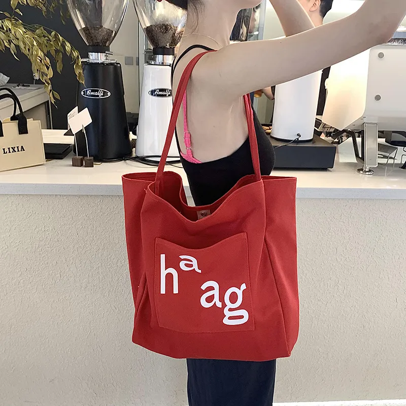 Letter Printed Canvas Women's Tote Bag Literary Style Large Capacity Student Schoolbag 2024 New Fashion Shoulder Bag display picture 27