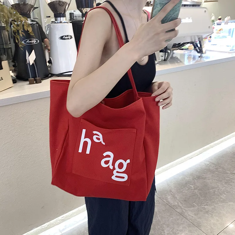 Letter Printed Canvas Women's Tote Bag Literary Style Large Capacity Student Schoolbag 2024 New Fashion Shoulder Bag display picture 29