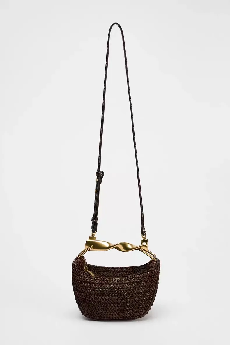 2025 New Special-Interest Design Woven Bag Portable Messenger Bag Metal Handle Straw Bag Beach Holiday Bag Fashion display picture 5