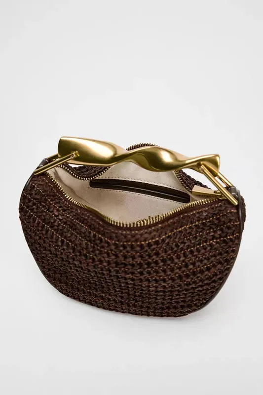 2025 New Special-Interest Design Woven Bag Portable Messenger Bag Metal Handle Straw Bag Beach Holiday Bag Fashion display picture 6