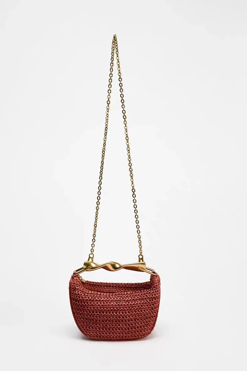 2025 New Special-Interest Design Woven Bag Portable Messenger Bag Metal Handle Straw Bag Beach Holiday Bag Fashion display picture 10