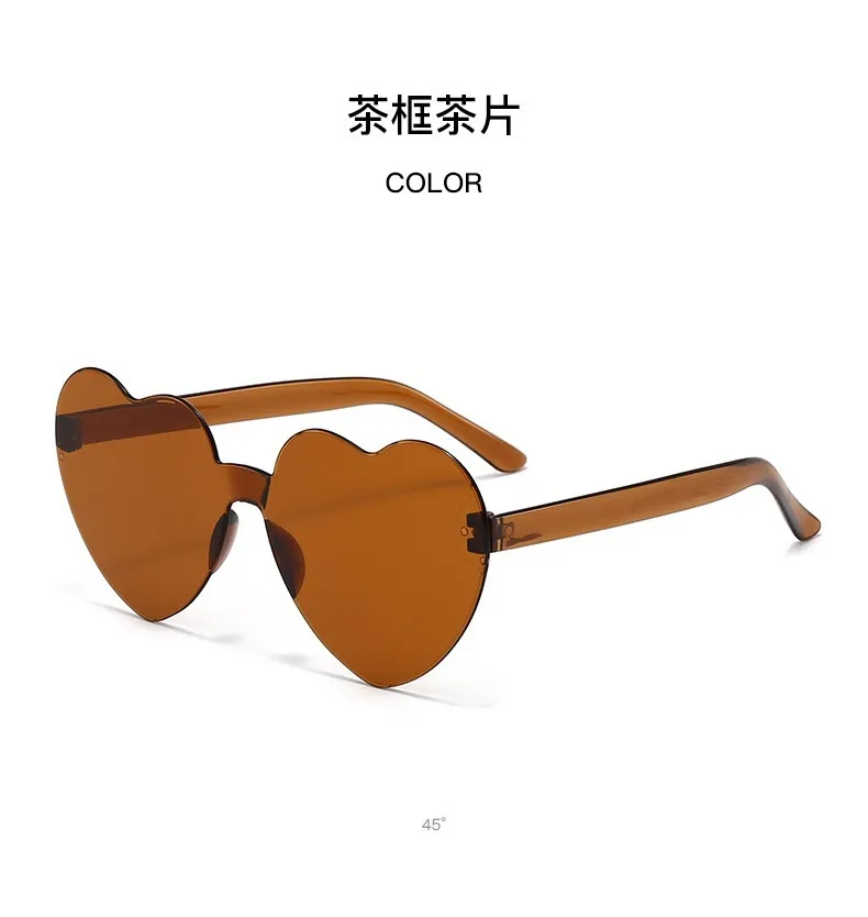 Europe And The United States Pink Heart Sunglasses Love Sunglasses Jelly Frameless Heart-shaped One-body Dazzling Color Glasses display picture 3