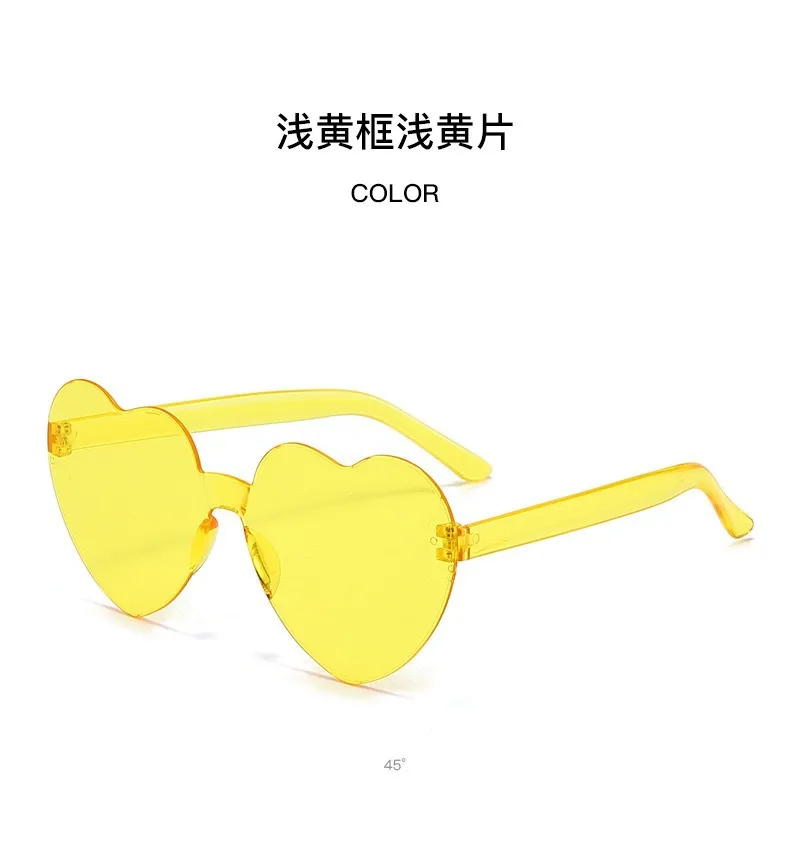 Europe And The United States Pink Heart Sunglasses Love Sunglasses Jelly Frameless Heart-shaped One-body Dazzling Color Glasses display picture 6