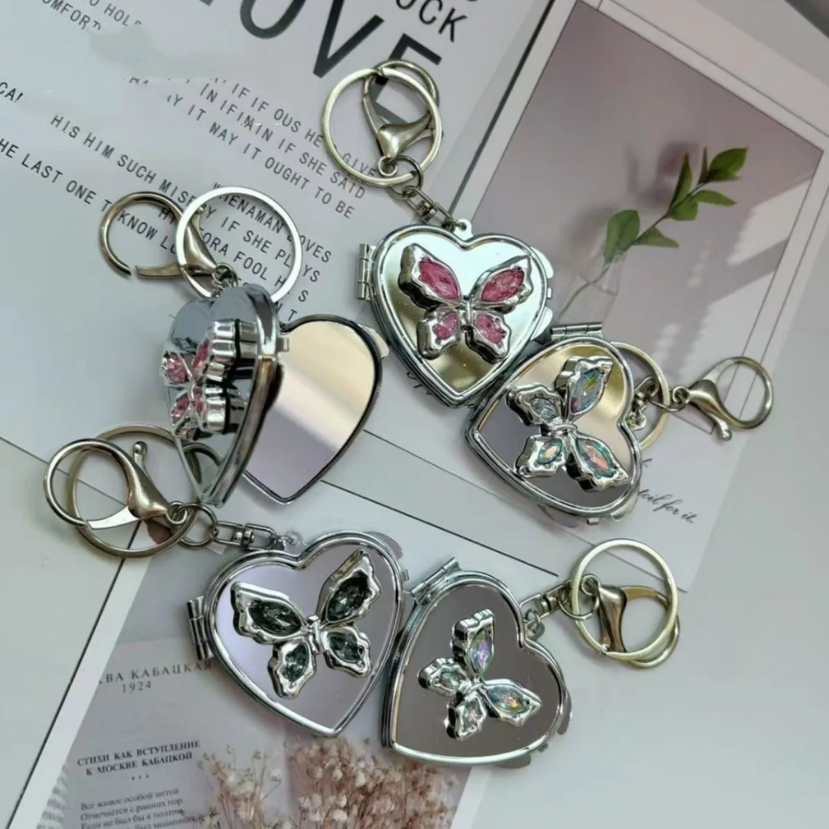 Butterfly Love Mirror Double-sided Folding Pendant Mirror Ins Bag Hanging High-grade Sense Car Keychain Cosmetic Mirror Pendant display picture 1