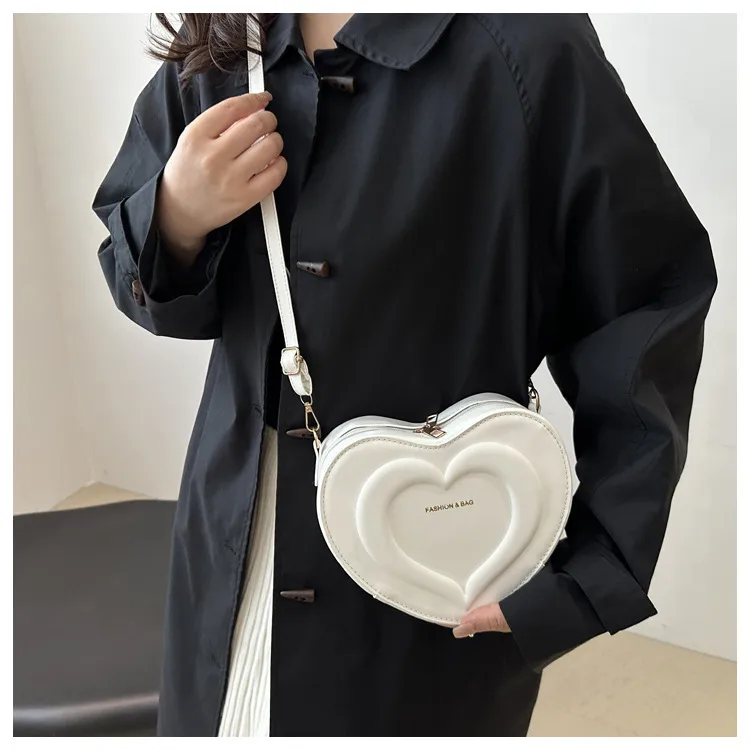 Fashion Heart-Shaped Small Bag  Autumn New Stylish Indented Crossbody Bag Ins Niche Design Shoulder Small Bag display picture 6