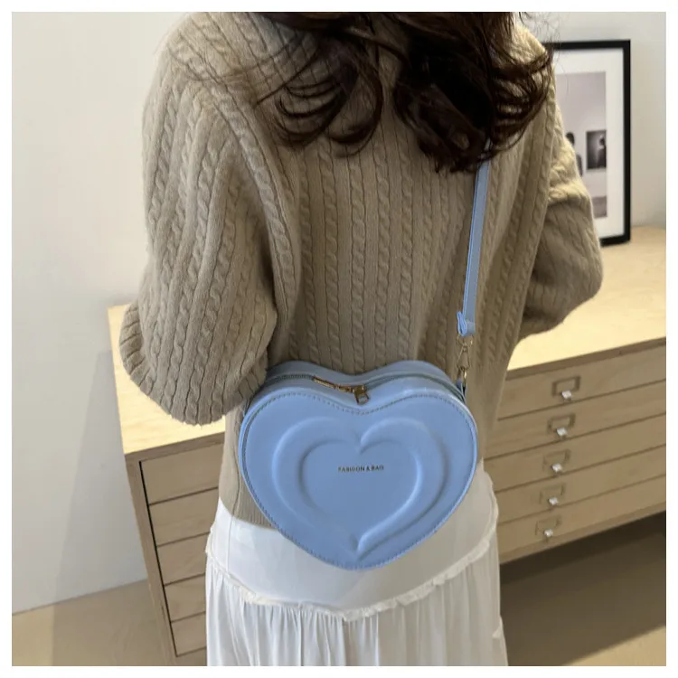 Fashion Heart-Shaped Small Bag  Autumn New Stylish Indented Crossbody Bag Ins Niche Design Shoulder Small Bag display picture 12