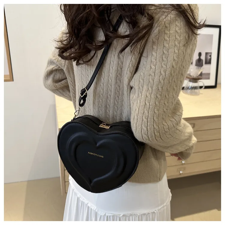 Fashion Heart-Shaped Small Bag  Autumn New Stylish Indented Crossbody Bag Ins Niche Design Shoulder Small Bag display picture 13