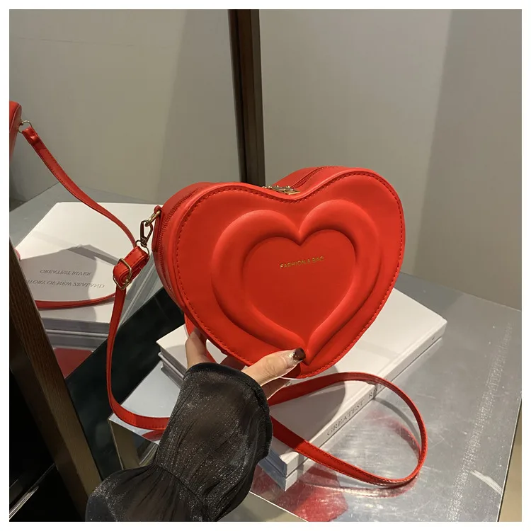Fashion Heart-Shaped Small Bag  Autumn New Stylish Indented Crossbody Bag Ins Niche Design Shoulder Small Bag display picture 16