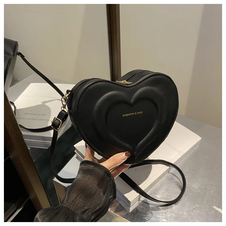 Fashion Heart-Shaped Small Bag  Autumn New Stylish Indented Crossbody Bag Ins Niche Design Shoulder Small Bag display picture 17
