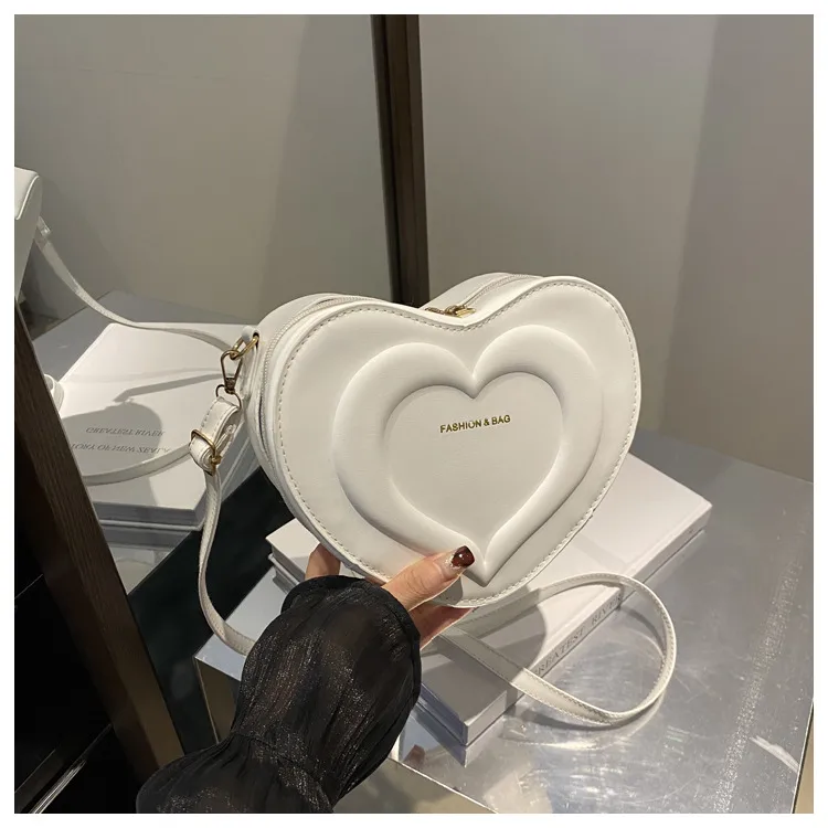 Fashion Heart-Shaped Small Bag  Autumn New Stylish Indented Crossbody Bag Ins Niche Design Shoulder Small Bag display picture 20
