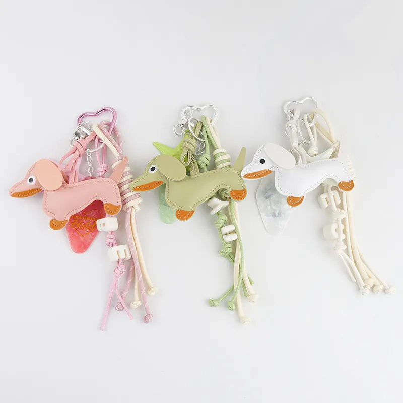 Cute Leather Dachshund Keychain Starfish Letter Knot Decoration Multicolor Optional Bag Cute Fun Hanging Jewelry display picture 3