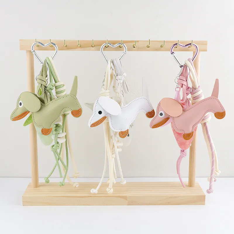 Cute Leather Dachshund Keychain Starfish Letter Knot Decoration Multicolor Optional Bag Cute Fun Hanging Jewelry display picture 5