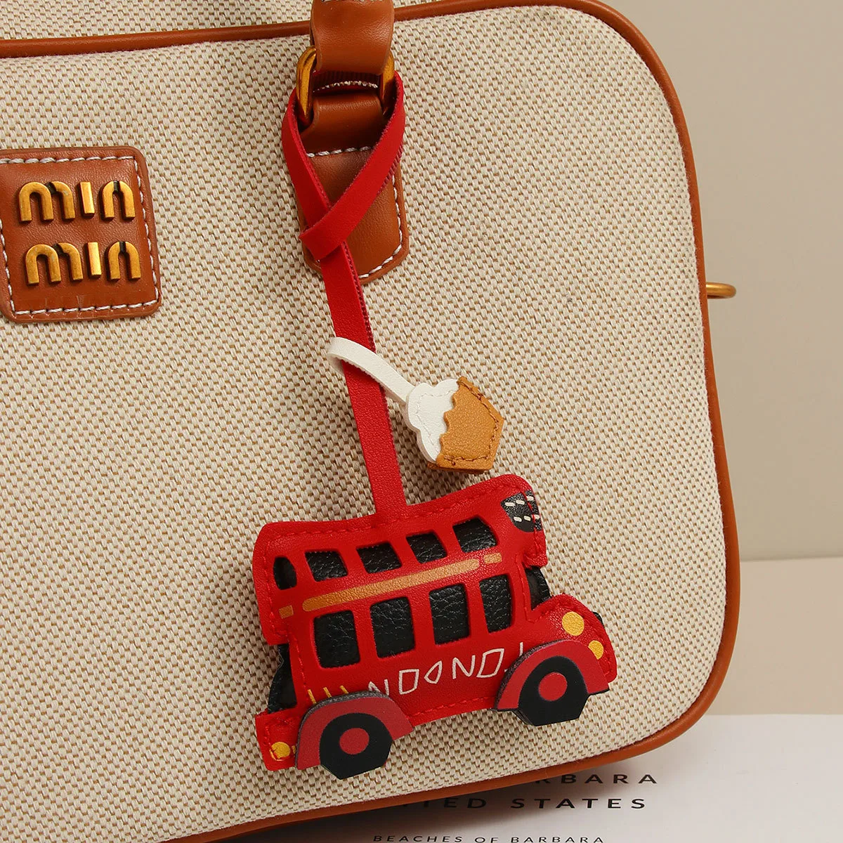 London Bus Car Leather Bag Pendant Key Chain Accessories Handmade Coffee Cup Simple Bag Pendant display picture 5