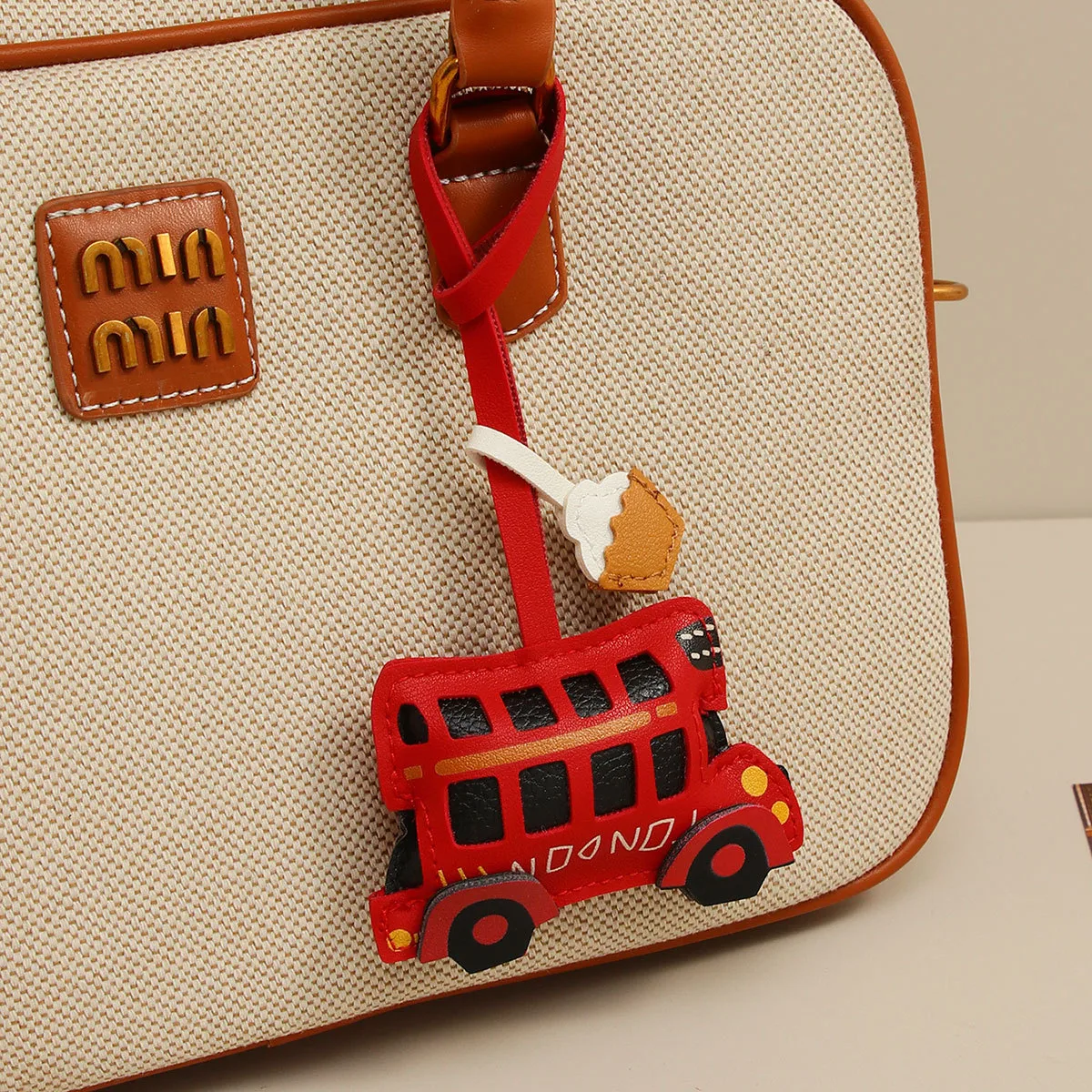 London Bus Car Leather Bag Pendant Key Chain Accessories Handmade Coffee Cup Simple Bag Pendant display picture 4