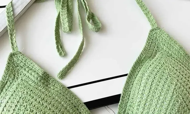 Ethnic Style Fashion Sexy Small Camisole Seaside Beach Lace-up Hollow-out Knitted Short Halter Shirt For Women display picture 6