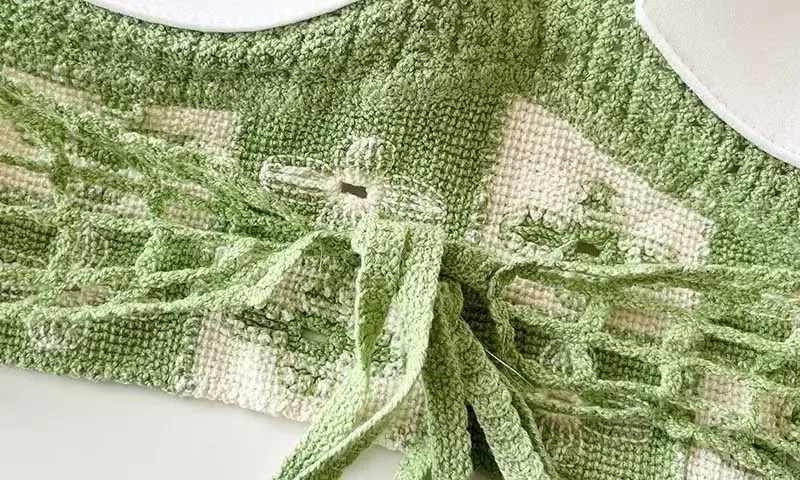 Ethnic Style Fashion Sexy Small Camisole Seaside Beach Lace-up Hollow-out Knitted Short Halter Shirt For Women display picture 12