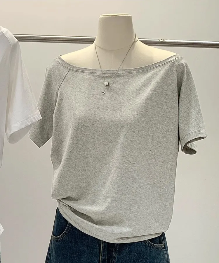 Hot Girl Style Off-line Collar Slant Shoulder Top Women's Summer  New Niche Leaky Collarbone Loose Short-sleeved White T-shirt display picture 11