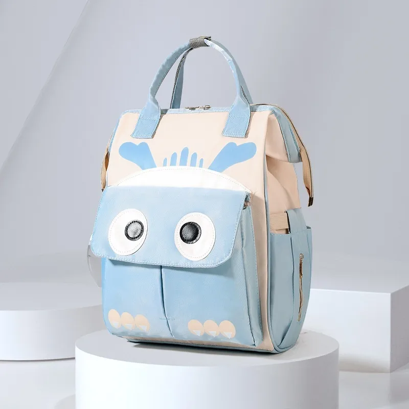 Cartoon Color Block Travel Daily Diaper Backpack display picture 3
