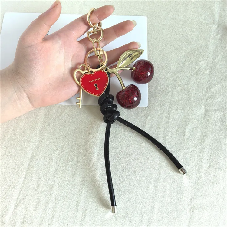 Explosions Miu Style Woven Rope Exquisite Simulation Cherry Fruit Cherry Bag Pendant Keychain Pendant display picture 6