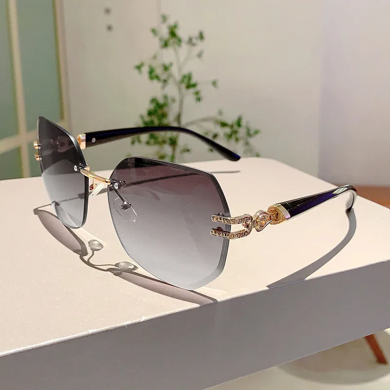 Style Ins Fashionable Frameless Cut Edge Gradient Sunglasses Light Luxury Elegant Personalized Trendy Irregular Sunglasses display picture 15
