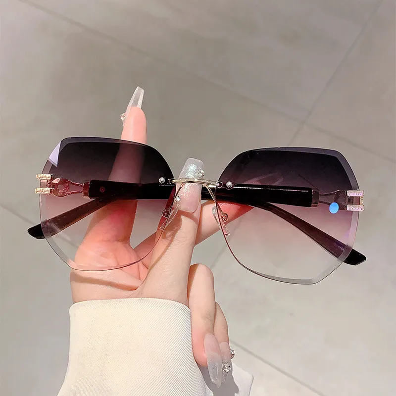 Style Ins Fashionable Frameless Cut Edge Gradient Sunglasses Light Luxury Elegant Personalized Trendy Irregular Sunglasses display picture 2