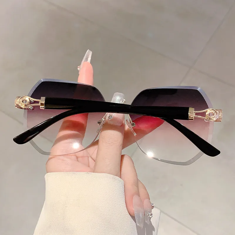 Style Ins Fashionable Frameless Cut Edge Gradient Sunglasses Light Luxury Elegant Personalized Trendy Irregular Sunglasses display picture 3