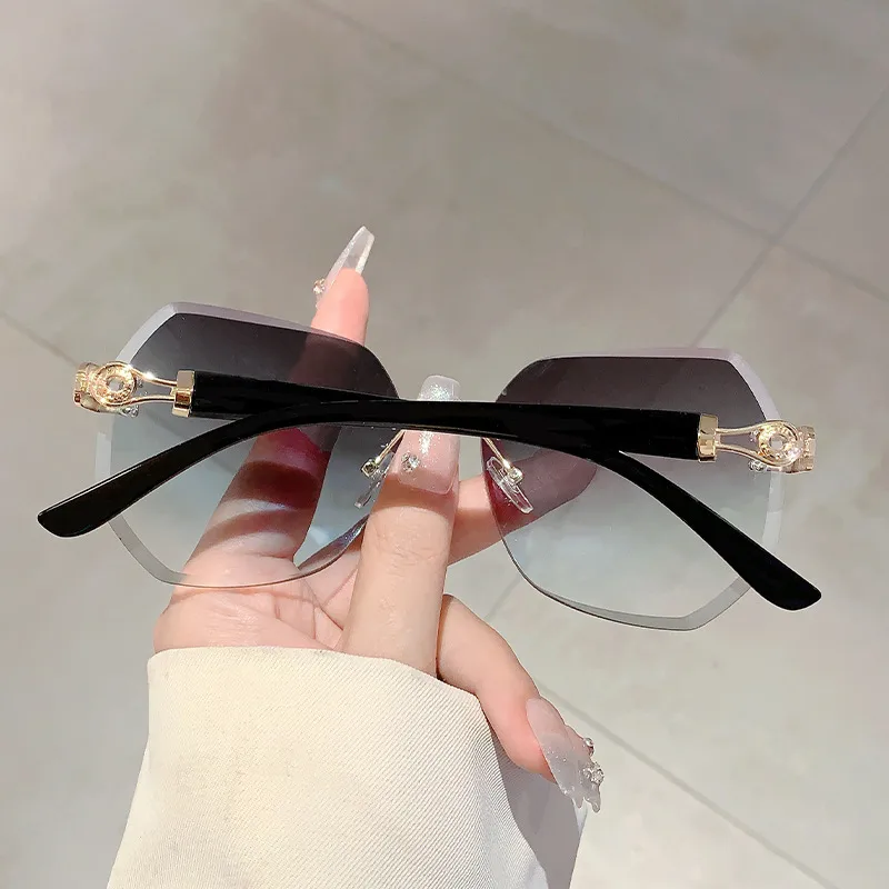 Style Ins Fashionable Frameless Cut Edge Gradient Sunglasses Light Luxury Elegant Personalized Trendy Irregular Sunglasses display picture 5