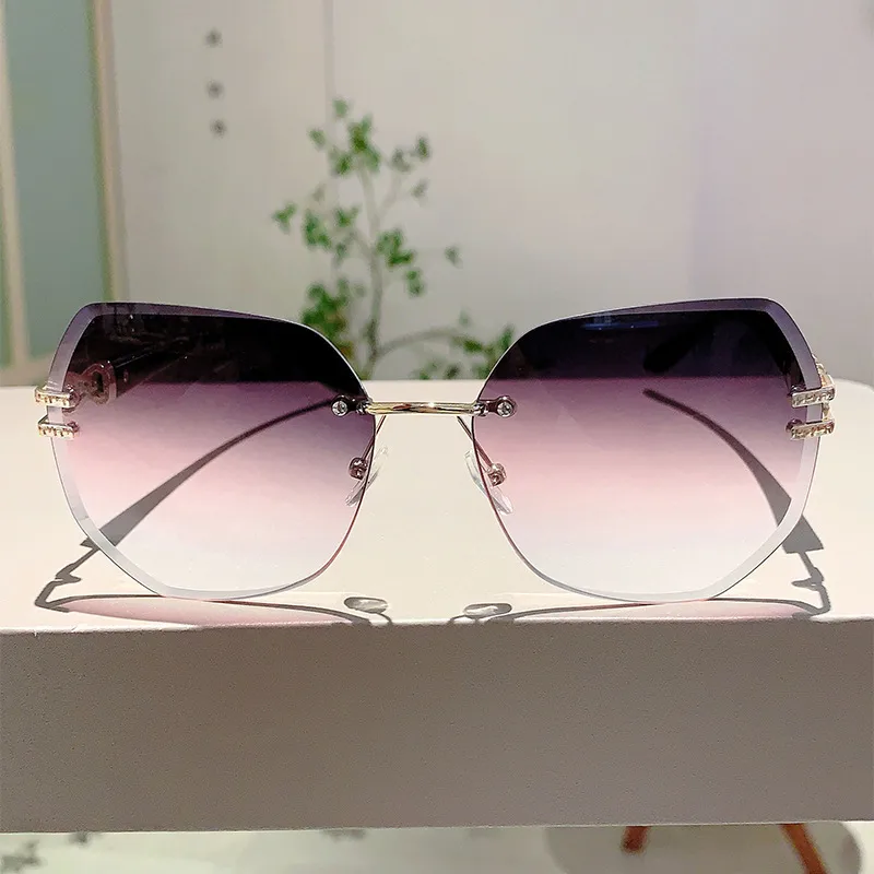 Style Ins Fashionable Frameless Cut Edge Gradient Sunglasses Light Luxury Elegant Personalized Trendy Irregular Sunglasses display picture 8