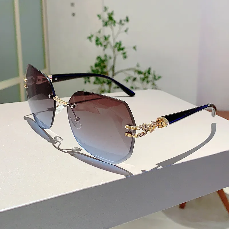 Style Ins Fashionable Frameless Cut Edge Gradient Sunglasses Light Luxury Elegant Personalized Trendy Irregular Sunglasses display picture 11