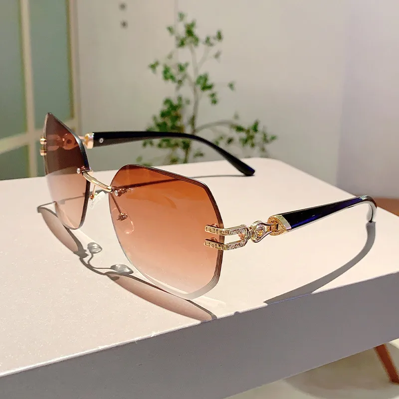 Style Ins Fashionable Frameless Cut Edge Gradient Sunglasses Light Luxury Elegant Personalized Trendy Irregular Sunglasses display picture 13