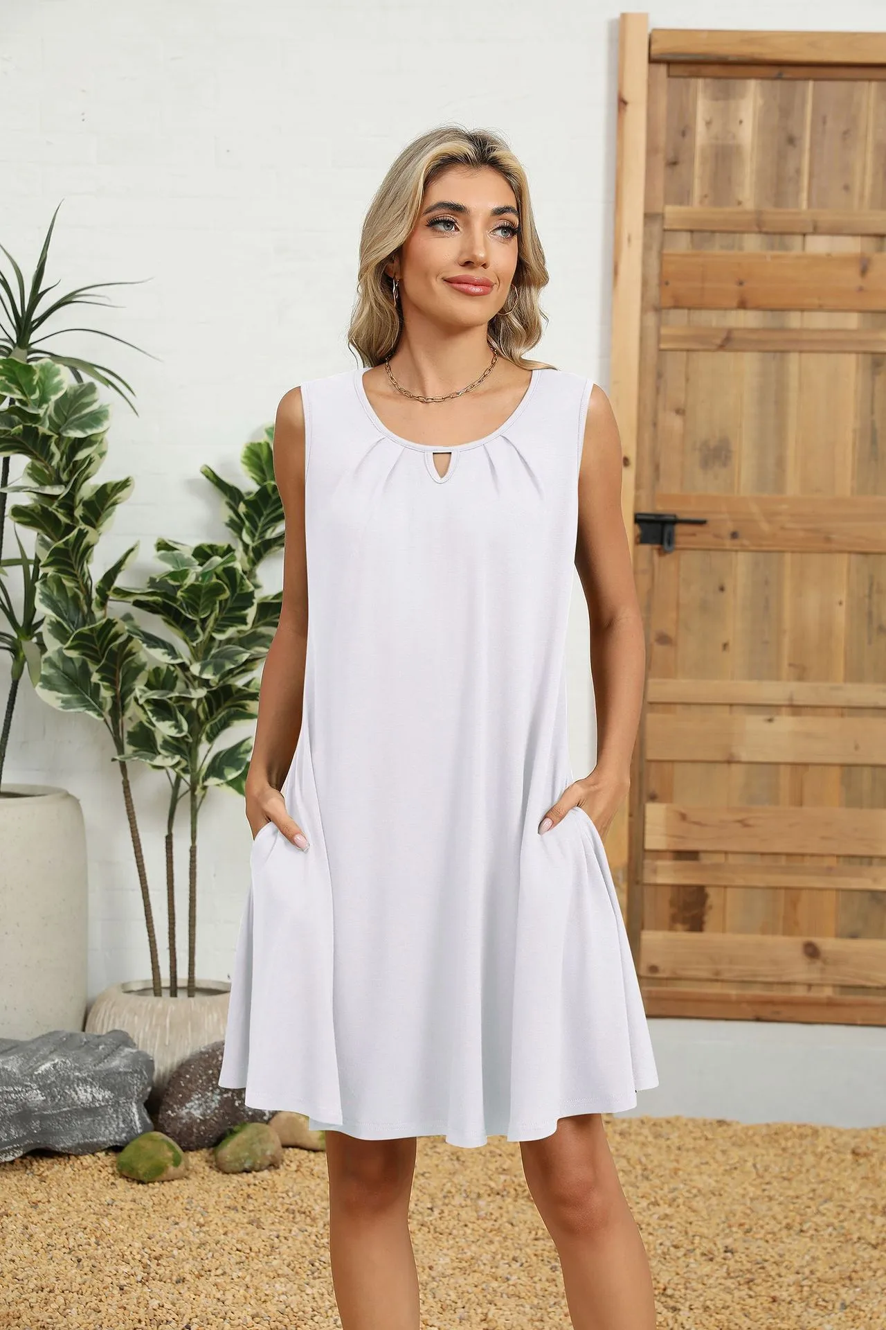 Europe And The United States  Foreign Trade  Summer New Solid Color Round Neck Hollow Pleated Sleeveless Pocket Dress display picture 33