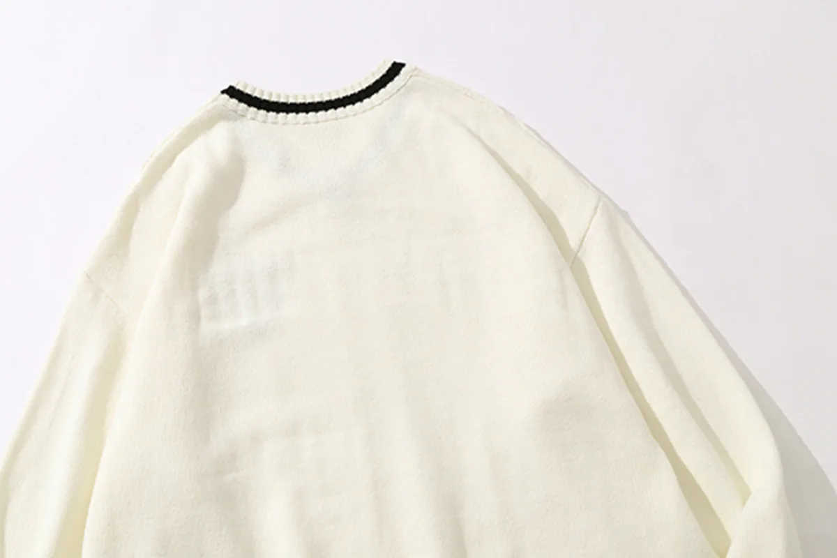 Jiayiku Fashion Brand Vintage Preppy Style V-neck Sweater Badge JK Uniform Twisted Flower Bottoming Long Sleeve Sweater display picture 12