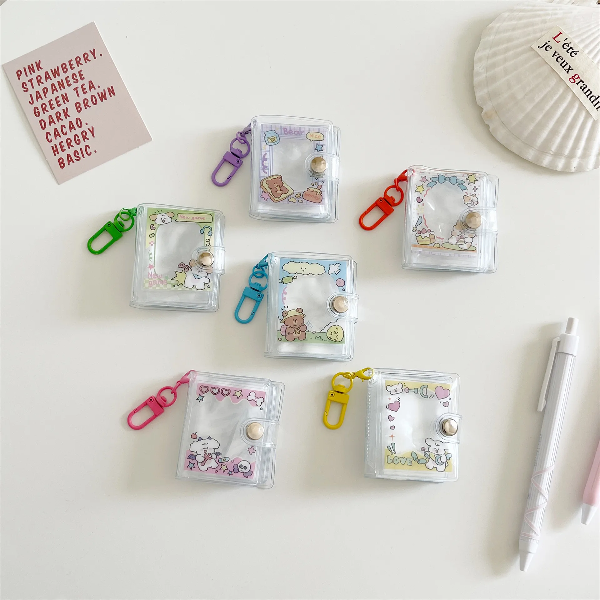New Style Cartoon Mini Photo Album 2 Inch ID Photo Shapes Storage Book Star Chasing Keychain Hook Pendant Bag display picture 3