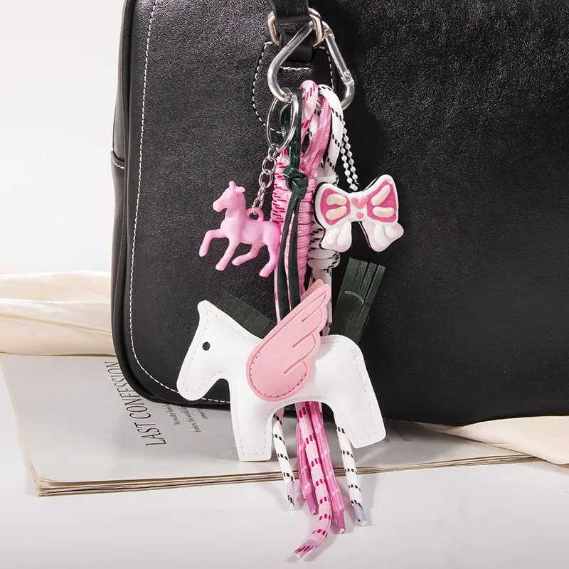 New MIU Cute Leather Pegasus Pendant Pony Bow Woven Rope Keychain Advanced Sense Bag Hanging display picture 2