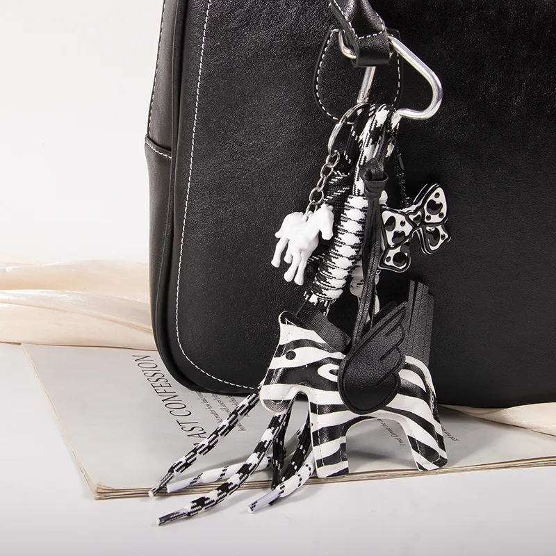 New MIU Cute Leather Pegasus Pendant Pony Bow Woven Rope Keychain Advanced Sense Bag Hanging display picture 4