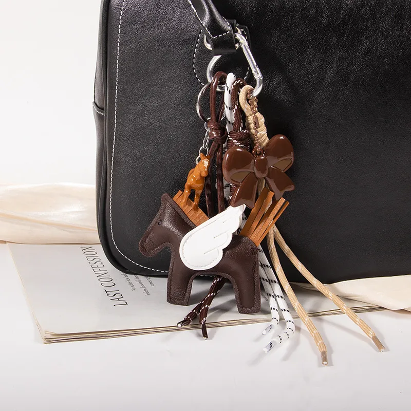 New MIU Cute Leather Pegasus Pendant Pony Bow Woven Rope Keychain Advanced Sense Bag Hanging display picture 6