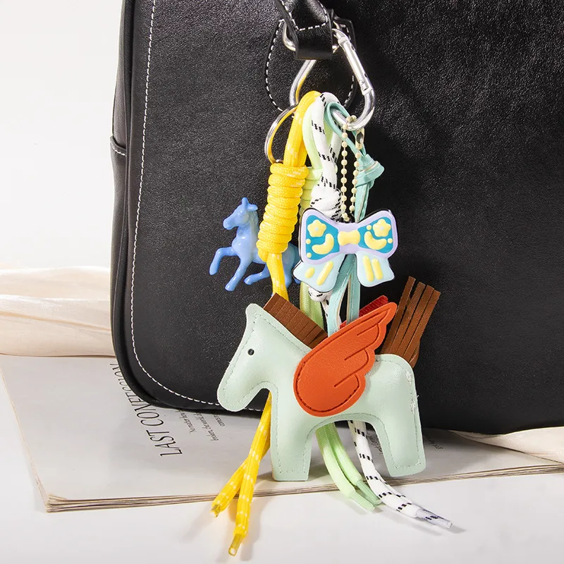 New MIU Cute Leather Pegasus Pendant Pony Bow Woven Rope Keychain Advanced Sense Bag Hanging display picture 7