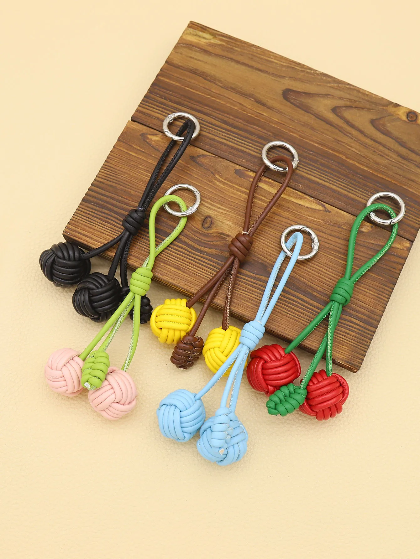 Handmade DIY Contrast Color Miu Series Woven Cherry Pu Leather Double Spherical Bag Hanging Hanging Piece Pendant Key Chain Accessories display picture 1
