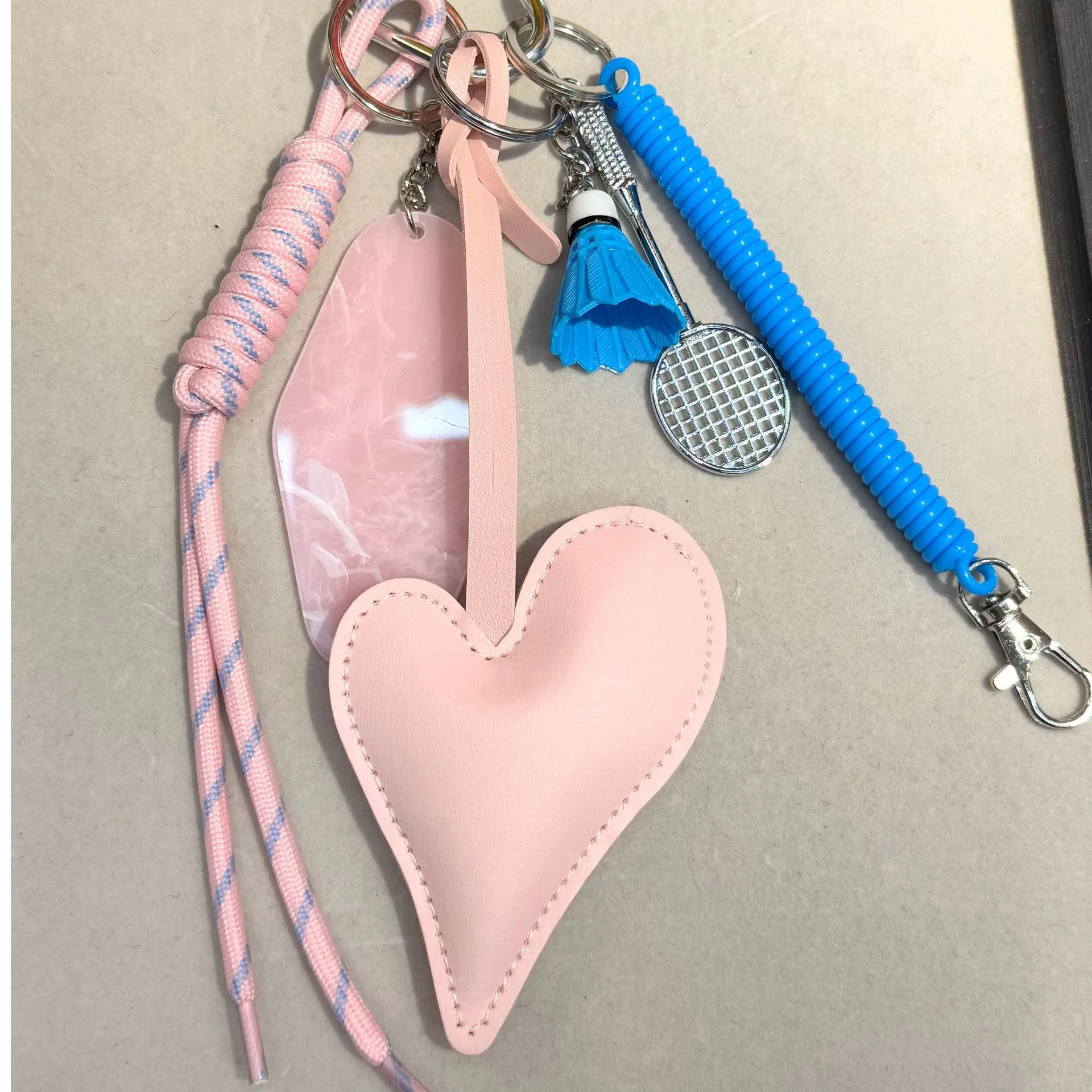 Original Miu Series Classic Love Oblique Pattern Affordable Luxury Style All-Match Peach Heart Bag Hanging High-Grade Leather Temperament Pendant display picture 1