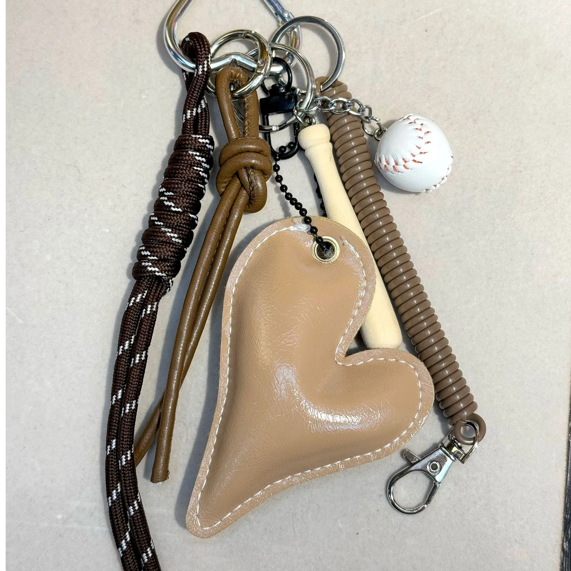 Original Miu Series Classic Love Oblique Pattern Affordable Luxury Style All-Match Peach Heart Bag Hanging High-Grade Leather Temperament Pendant display picture 4